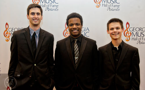 Patrick Arthur (left), Brandon Boone and Michael Opitz from the Kennesaw State University Jazz Trio walk the red carpet for the 2014 Georgia Music Hall of Fame Awards at the Georgia World Congress Center in Atlanta on Saturday, October 11, 2014. 