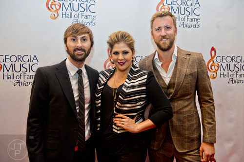 Dave Haywood (left), Hillary Scott and Charles Kelley from the band Lady Antebellum walk the red carpet for the 2014 Georgia Music Hall of Fame Awards at the Georgia World Congress Center in Atlanta on Saturday, October 11, 2014. 