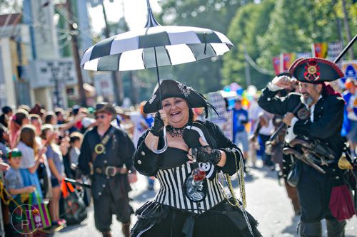 Dressed as a pirate, Selena Copeland (center) marches in the 14th annual Little 5 Points Halloween Parade in Atlanta on Saturday, October 18, 2014. 
