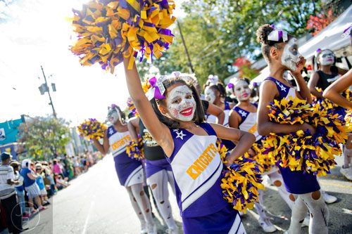 Jayla Dunlop (center) marches in the 14th annual Little 5 Points Halloween Parade in Atlanta on Saturday, October 18, 2014. 