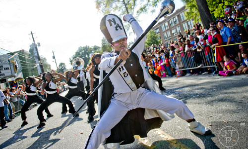 North Atlanta High School drum major Mary Hinton marches in the 14th annual Little 5 Points Halloween Parade in Atlanta on Saturday, October 18, 2014. 
