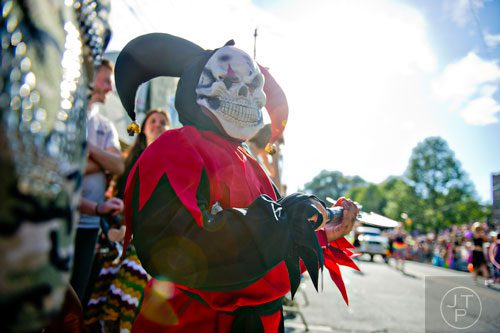 Seanan McHoney (center) watches the 14th annual Little 5 Points Halloween Parade in Atlanta on Saturday, October 18, 2014. 
