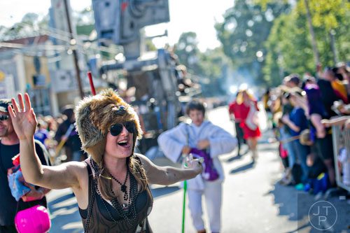 Dressed as Chewbacca, Heidi Howard (left) marches in the 14th annual Little 5 Points Halloween Parade in Atlanta on Saturday, October 18, 2014. 