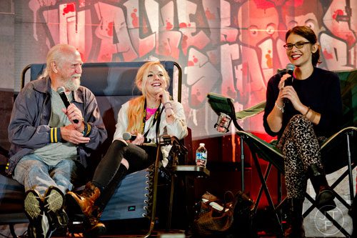 Scott Wilson (left), Emily Kinney and Lauren Cohan who portray Herschel, Beth and Maggie on the Walking Dead, talk to fans at a panel during Walker Stalker Con in Atlanta on Sunday, October 19, 2014.