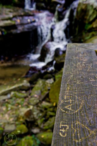 Graffiti marks one of the overlooks on the trail up to Amicalola Falls at Amicalola State Park in Dawsonville on Tuesday, September 23, 2014.