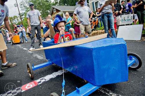Ian Cooper takes off from the starting line during the 4th annual Madison Ave. Soap Box Derby in Decatur on Saturday, September 27, 2014.