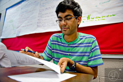 Haroon Alam takes a quiz during his english class at Walton High School on Tuesday, October 14, 2014. 
