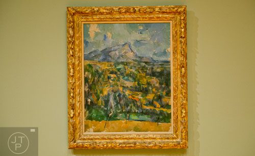 Paul Cezanne's oil on canvas Mont Sainte-Victoire sits on display in the High Museum of Art's new "Cezanne and the Modern: Masterpieces of European Art from the Pearlman Collection" exhibit on Tuesday, October 14, 2014.