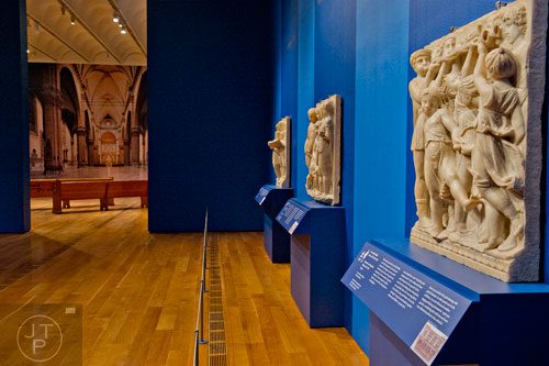 Three marble panels from Italian sculptor Luca della Robbia's famed organ loft created for Florence Cathedral sit on display in the High Museum of Art's new "Make a Joyful Noise": Renaissance Art and Music at Florence Cathedral exhibit on Tuesday, October 14, 2014.  