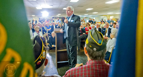 Senator John McCain speaks to a crowd of supporters before Republican candidate David Perdue takes the stage at the VFW Post 2681 in Marietta on Wednesday, October 15, 2014.  