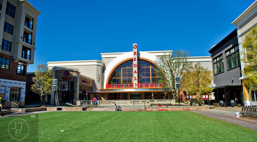 A grassy area that can transform into an ice skating rink in winter sits in front of the Regal Cinemas at the new Avalon development in Alpharetta on Friday, October 17, 2014. 