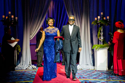 Dr. John S. Wilson Jr., president of Morehouse College, and his wife Carol are introduced during the 31st annual United Negro College Fund Mayor's Masked Ball at the Atlanta Marriott Marquis in downtown on Saturday, December 20, 2014. 
