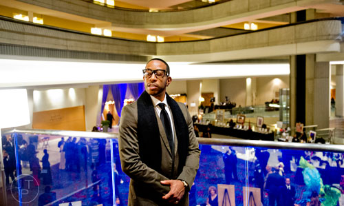 Christopher Bridges, better known as Ludacris, stands in the lobby during the 31st annual United Negro College Fund Mayor's Masked Ball at the Atlanta Marriott Marquis in downtown on Saturday, December 20, 2014. 