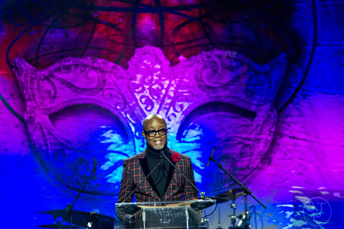 Comedian Jonathan Slocumb emcees the Parade of Masks during the 31st annual United Negro College Fund Mayor's Masked Ball at the Atlanta Marriott Marquis in downtown on Saturday, December 20, 2014. 