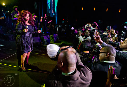Chaka Khan (left) performs on stage during the 31st annual United Negro College Fund Mayor's Masked Ball at the Atlanta Marriott Marquis in downtown on Saturday, December 20, 2014. 