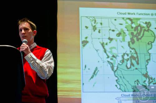 John Matthews pitches an app he helped create with his team to a panel of judges during The Weather Channel's Hack-A-Thon at the Atlanta Marriott Northwest at Galleria on Friday, December 12, 2014.