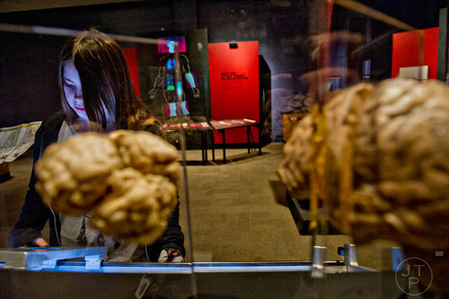 Kiana Wells checks out an interactive display in the Goosebumps: The Science of Fear exhibit at the Fernbank Museum of Natural History in Atlanta on Saturday, December 27, 2014.  