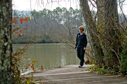 Philomena Strenger hikes along the River Boardwalk Trail at the Chattahoochee Nature Center in Roswell on Saturday, December 27, 2014.  