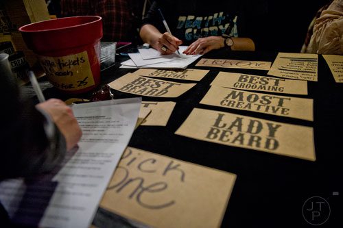 Contestants register for the 4th annual Battle of the Beards at Smith's Olde Bar in Atlanta on Saturday, December 13, 2014.