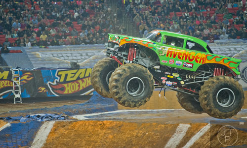 Avenger launches into the air during Monster Jam at the Georgia Dome in Atlanta on Saturday, January 10, 2015. 