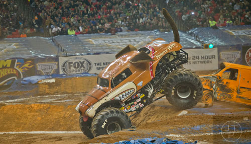 Monster Mutt almost flips during Monster Jam at the Georgia Dome in Atlanta on Saturday, January 10, 2015. 