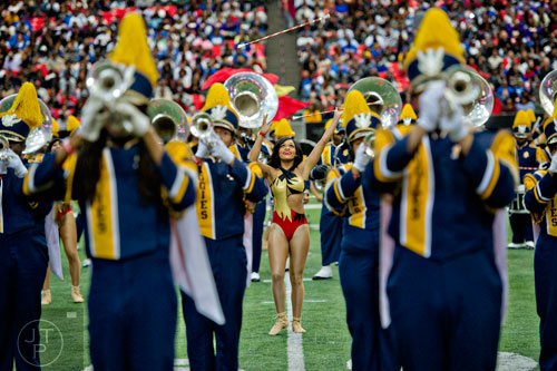North Carolina A&T University's Brianna Blount (center) tosses her baton as she performs during the Honda Battle of the Bands at the Georgia Done in Atlanta on Saturday, January 24, 2015. 