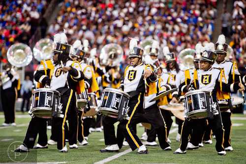 Alabama State University's Christopher Gulley (left), Michael Floyd and Ayana Cummings perform during the Honda Battle of the Bands at the Georgia Done in Atlanta on Saturday, January 24, 2015.