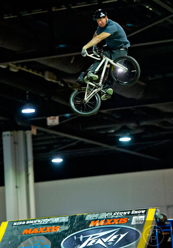 Scott Wirch catches some air while warming up for the King BMX show during Jam Zone at the Georgia World Congress Center in Atlanta on Saturday, February 7, 2015.