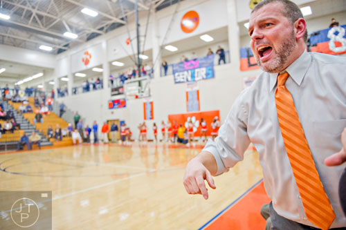 Parkview's Kirk Call coaches from the sidelines during the third round of the girls state basketball championship against Osborne on Tuesday, February 24, 2015.   