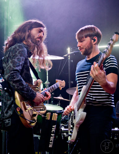 Imagine Dragons' Wayne Sermon (left) and Ben McKee perform on stage at Terminal West in Atlanta to a sold out show on Wednesday, February 25, 2015.