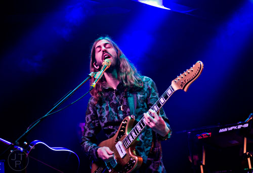Imagine Dragons' Wayne Sermon performs on stage at Terminal West in Atlanta to a sold out show on Wednesday, February 25, 2015.   