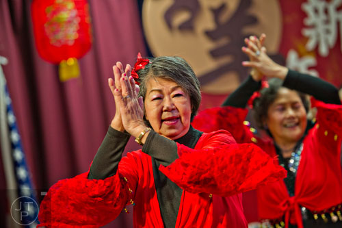 Lee Phonge performs on stage during the Chinese Lunar New Year celebration in Chamblee on Saturday, February 21, 2015. 