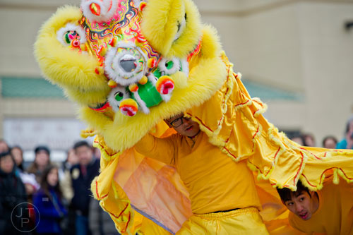 Harold Liu (left) and Christopher Lu perform a traditional lion dance during the Chinese Lunar New Year celebration in Chamblee on Saturday, February 21, 2015. 
