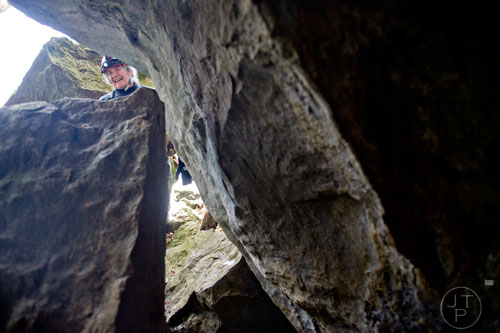 Janice "J.J." Broome stands at the mouth of Frick's Cave in Chickamauga, Ga. during the Southeastern Cave Conservancy Inc.'s open house on Saturday, February 28, 2015. 