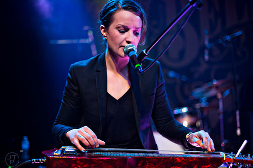 Megan McCormick plays the steel guitar as she performs on stage with Odessa at Terminal West in Atlanta on Wednesday, March 11, 2015. 