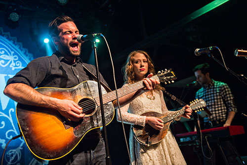 Zach Williams (left), Kanene Donehey Pipkin and Jason Pipkin of the band The Lone Bellow perform on stage at Terminal West in Atlanta on Wednesday, March 11, 2015.  