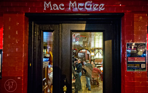 Patrons drink at Mac McGee in Roswell on Friday, February 27, 2015. 
