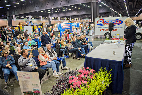 Victoria D'Amico (right) talks to a group of people during a home remodeling seminar during the 37th annual Spring Atlanta Home Show at the Cobb Galleria Centre in Atlanta on Sunday, March 22, 2015. 