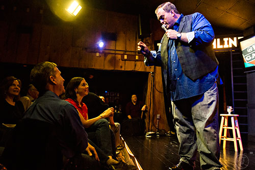 Comedian Billy Gardell (right) performs on stage at The Punchline in Atlanta on Friday, March 20, 2015. 