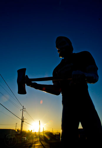 A statue of Paul Bunyan guards a neighborhoos in Tucson, Arizona as the sun sets on Monday, March 9, 2015.