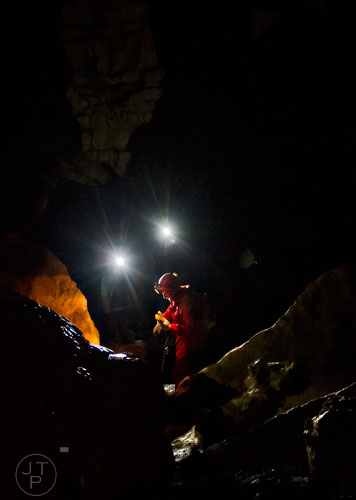 Cavers make their way through the inside Frick's Cave in Chickamauga, Ga. during the Southeastern Cave Conservancy Inc.'s open house on Saturday, February 28, 2015. 