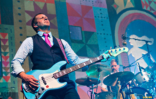 The Decemberists bassist Nate Query (left) performs on stage at The Tabernacle in Atlanta on Friday, April 10, 2015. 