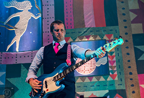 The Decemberists bassist Nate Query (left) performs on stage at The Tabernacle in Atlanta on Friday, April 10, 2015. 