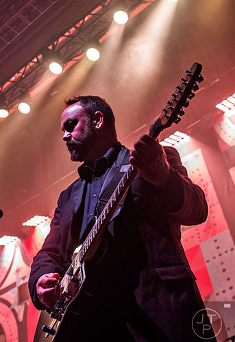 The Decemberists guitarist Chris Funk performs on stage at The Tabernacle in Atlanta on Friday, April 10, 2015. 
