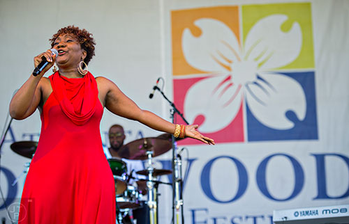 Rhonda Thomas performs on the main stage during the 79th annual Atlanta Dogwood Festival at Piedmont Park on Saturday, April 11, 2015.