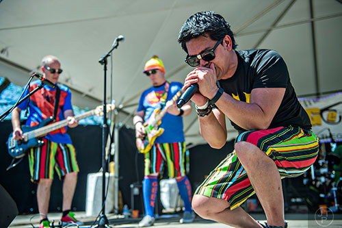Randy Casquejo (right), Tristan Brown and Mike Tetrick with the band The Geeks perform on stage during the Hogs & Hops Festival at The Masquerade in Atlanta on Saturday, April 11, 2015.