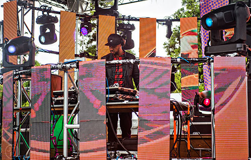 DJ Babey Drew performs on stage during the SweetWater 420 Fest at Centennial Olympic Park in Atlanta on Friday, April 17, 2015. 