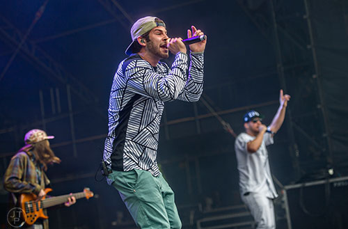Carter Schultz (center) and David von Mering (right) of Aer perform on stage during the SweetWater 420 Fest at Centennial Olympic Park in Atlanta on Friday, April 17, 2015. 