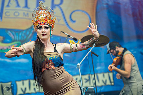 Zoe Jakes (left) and David Satori of Beats Antique perform on stage during the SweetWater 420 Fest at Centennial Olympic Park in Atlanta on Friday, April 17, 2015. 