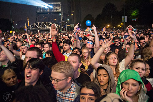 Thousands of fans watch Snoop Dogg perform on stage during the SweetWater 420 Fest at Centennial Olympic Park in Atlanta on Friday, April 17, 2015.